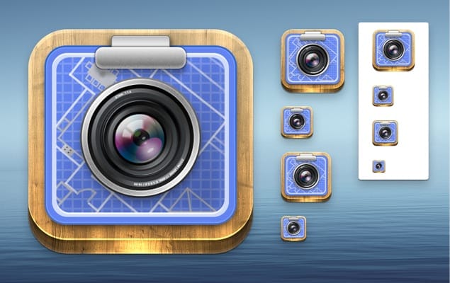 An iOS app icon showing a camera on a blueprint.